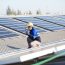 photovoltaic solar panels solar cells on roof top factory.